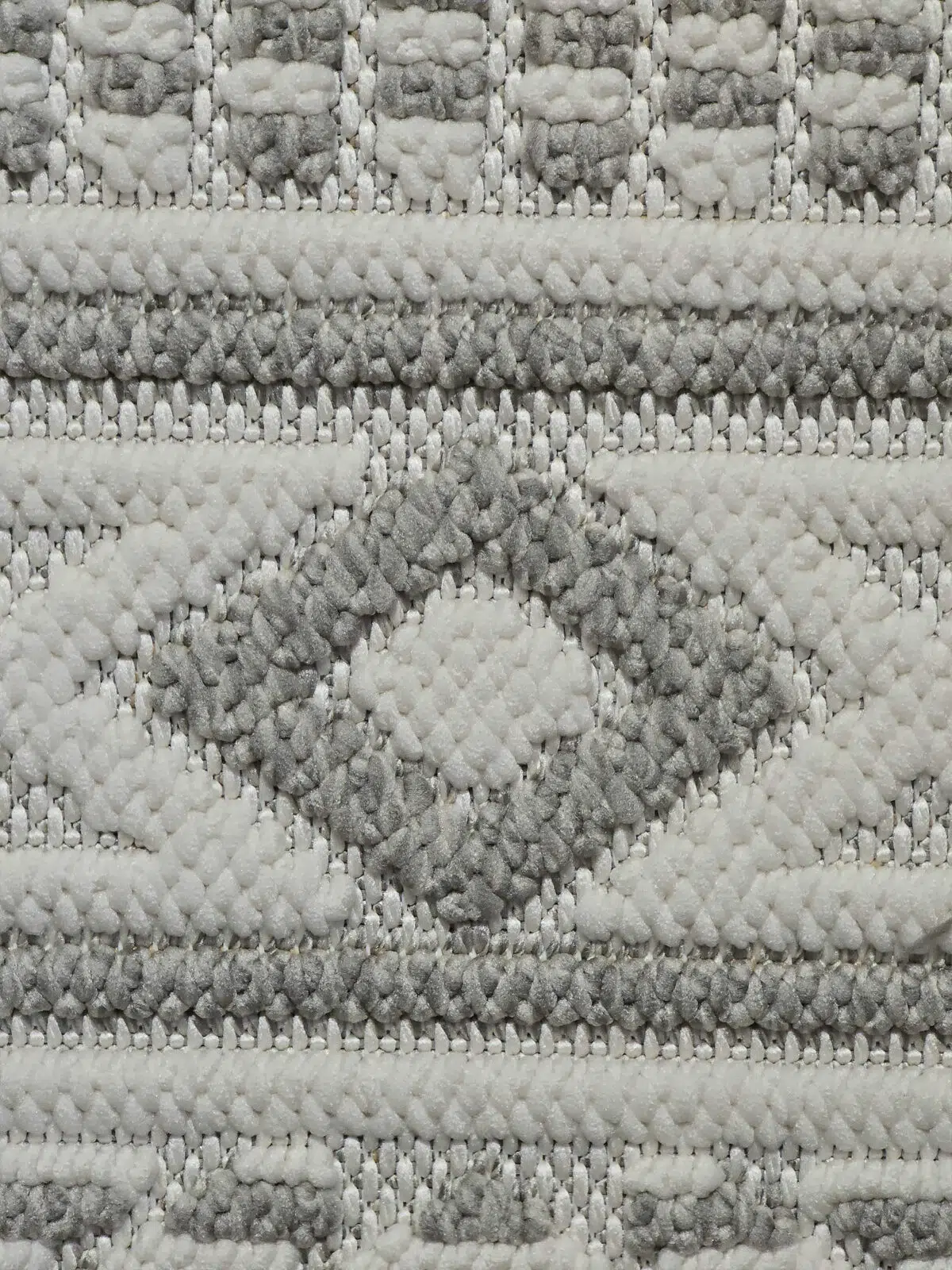 Macro image of plush diamond pattern with layered textures on Equinox rug