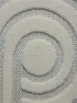 Macro shot of Nebula rug’s soft plush circle at the center of the loop