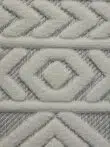 Macro shot of Luna rug’s texture with soft white raised weaving