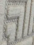 Angled close-up view of textured velvet pattern on Lyra carpet