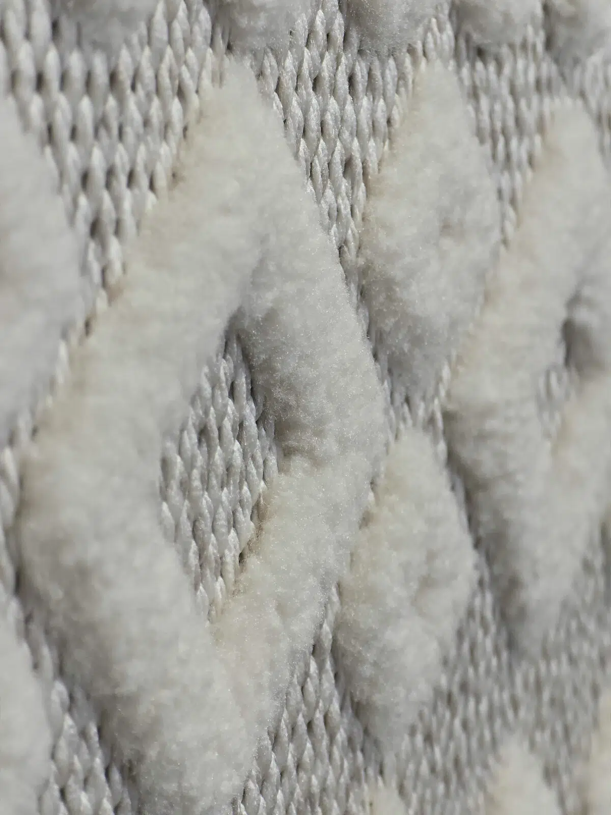 Side angle view of Nova rug showing 3D depth and softness of the pattern