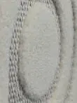 Side macro view of looped plush design on Nebula rug showing depth and layering