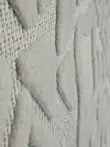 Slanted close-up of Apollo Rug showing triangular elements in high pile