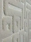 Detailed view of Aurora rug’s acrylic loop construction