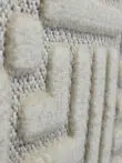 Tactile texture of triangle design on Lyra rug close-up