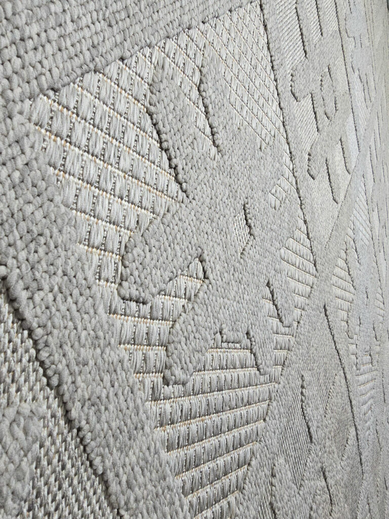 Skyline carpet macro showing silky texture and raised chevron