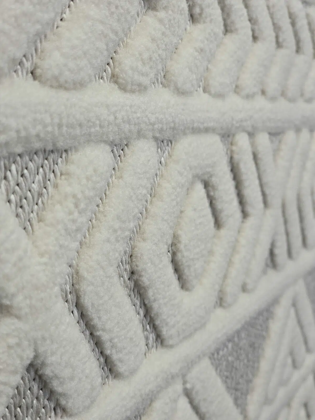 Side zoom showcasing Luna rug’s detailed geometric layout and plush texture