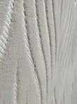 Side macro capturing linear flow of Atlas rug contours