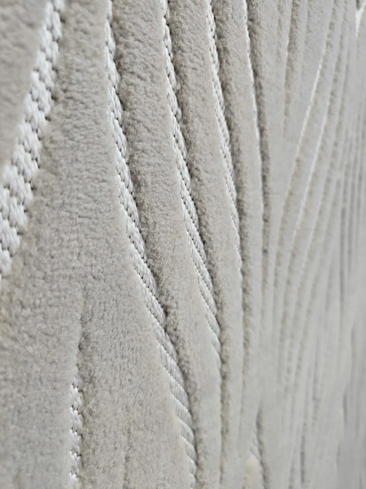 Side macro capturing linear flow of Atlas rug contours