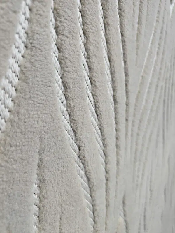 Side macro capturing linear flow of Atlas rug contours