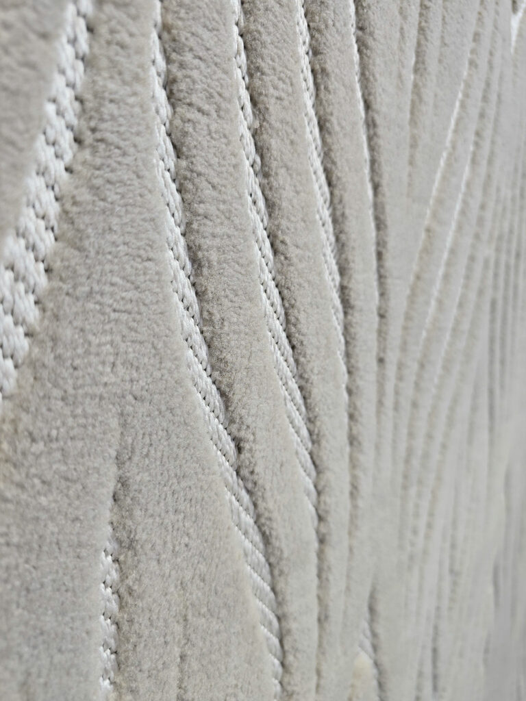Side macro capturing linear flow of Atlas rug contours
