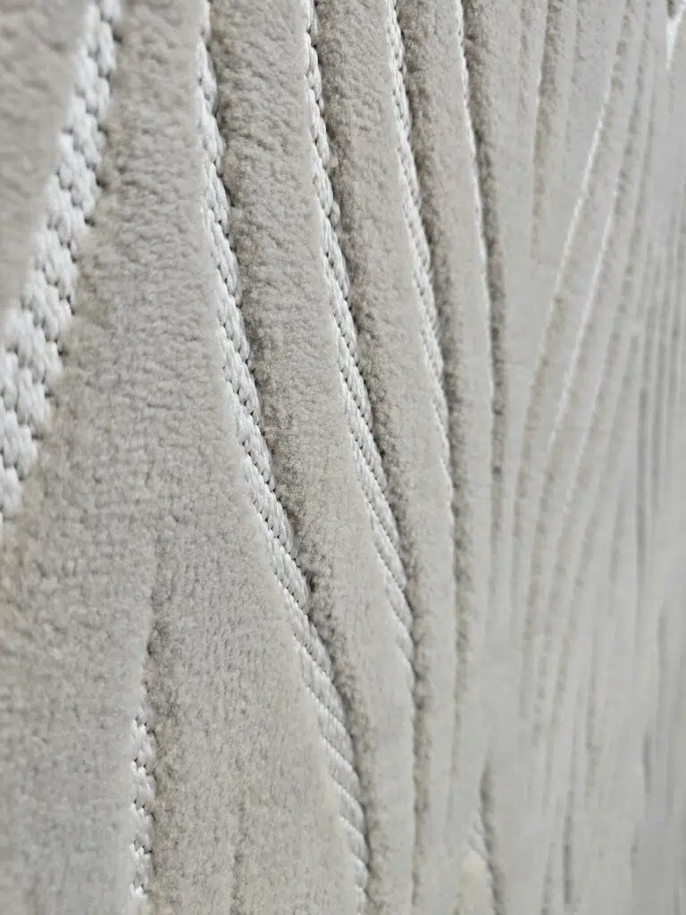 Side macro capturing linear flow of Atlas rug contours