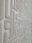 Angled close-up of Aurora rug highlighting 3D lines
