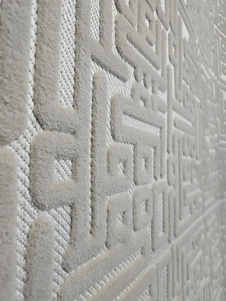 Angled close-up of Aurora rug highlighting 3D lines