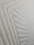 tight shot of precision weaving on Solaris Rug pattern