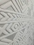 Side wide view of Luna rug displaying layered geometric patterns