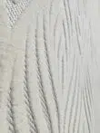 Side view showing soft plush flow of wave-like design on Titan rug