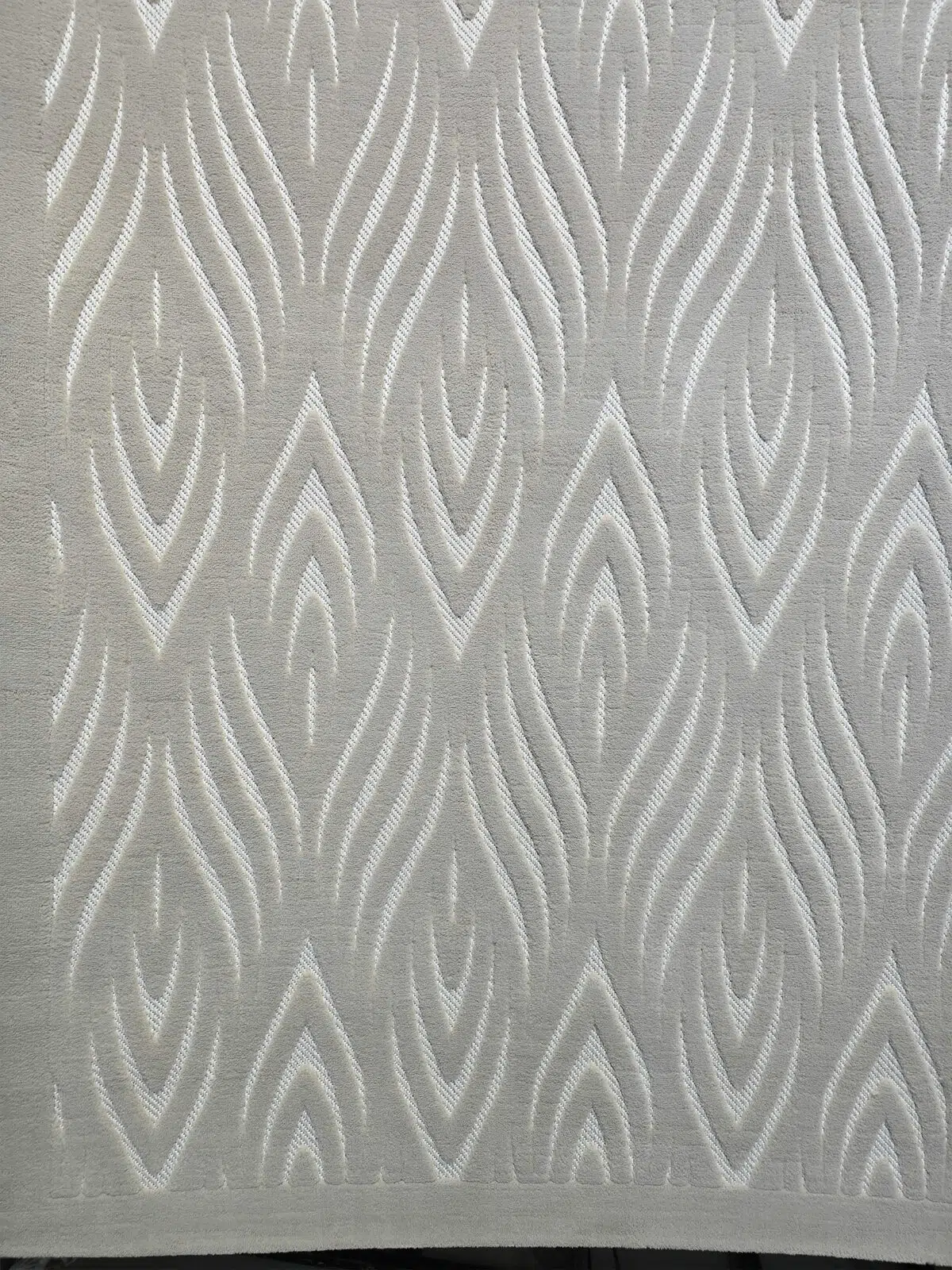 Detailed shot of Atlas rug line precision in soft pile