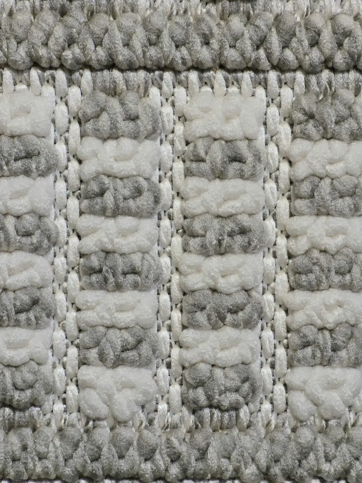 Side-angle shot showing flowing tribal patterns across the Equinox rug