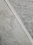 Back view and stitched edge of Twilight Rug showing durability and quality