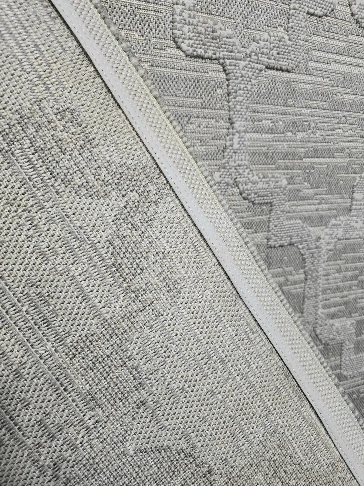 Back view and stitched edge of Twilight Rug showing durability and quality