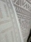 Underside of Eclipse rug showing strong mesh backing