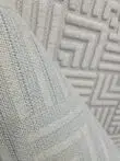 Backside texture of Lyra carpet showing fine machine-made weave