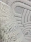 Underside view of Sirius rug showcasing strong mesh backing