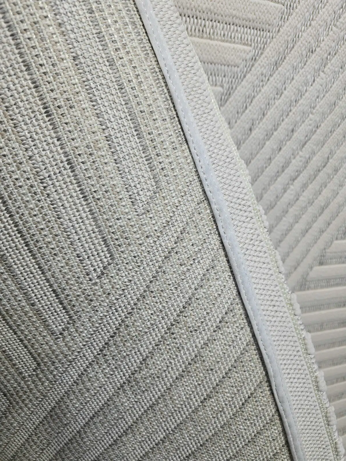 close-up of Solaris Rug backing and stitching