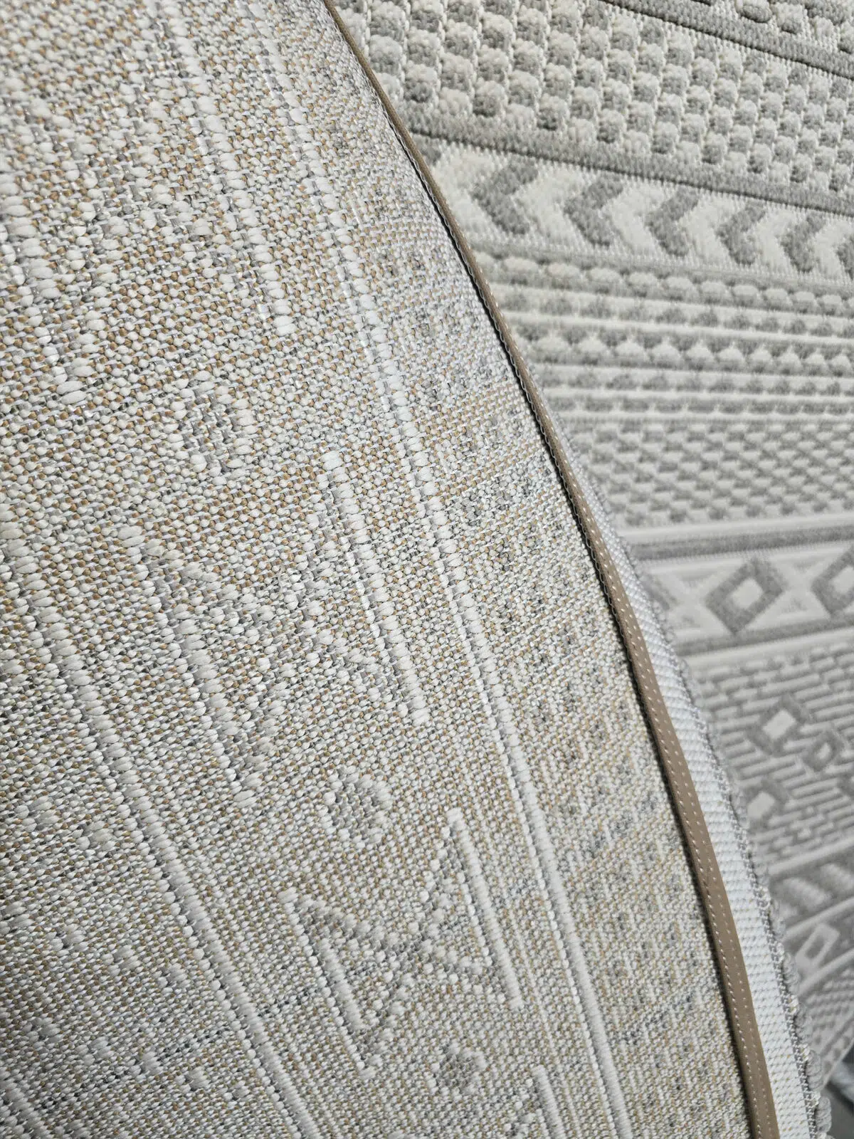Lower half of Equinox rug featuring complete row of diamond motifs and chevrons