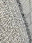 Close-up of Zephyr rug’s backing construction and base yarn texture