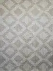 Front-facing view of Comet rug in soft beige tones