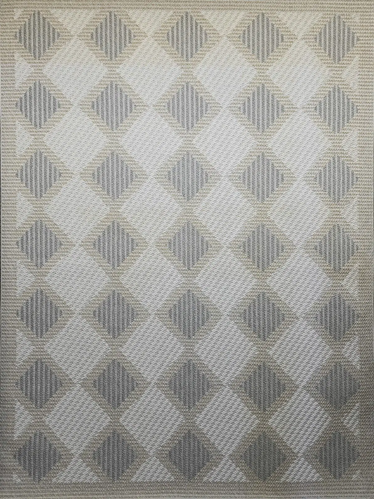 Full top view of Crater rug showing its diamond geometric pattern