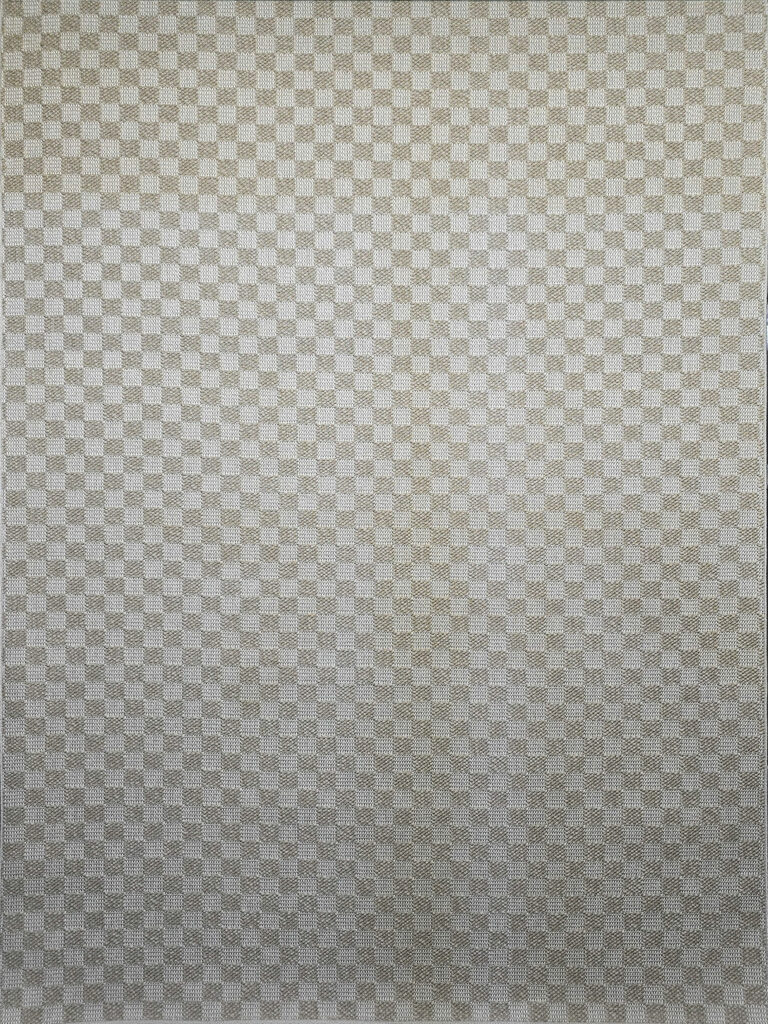Overhead view showing the geometric texture of the Helios rug in beige