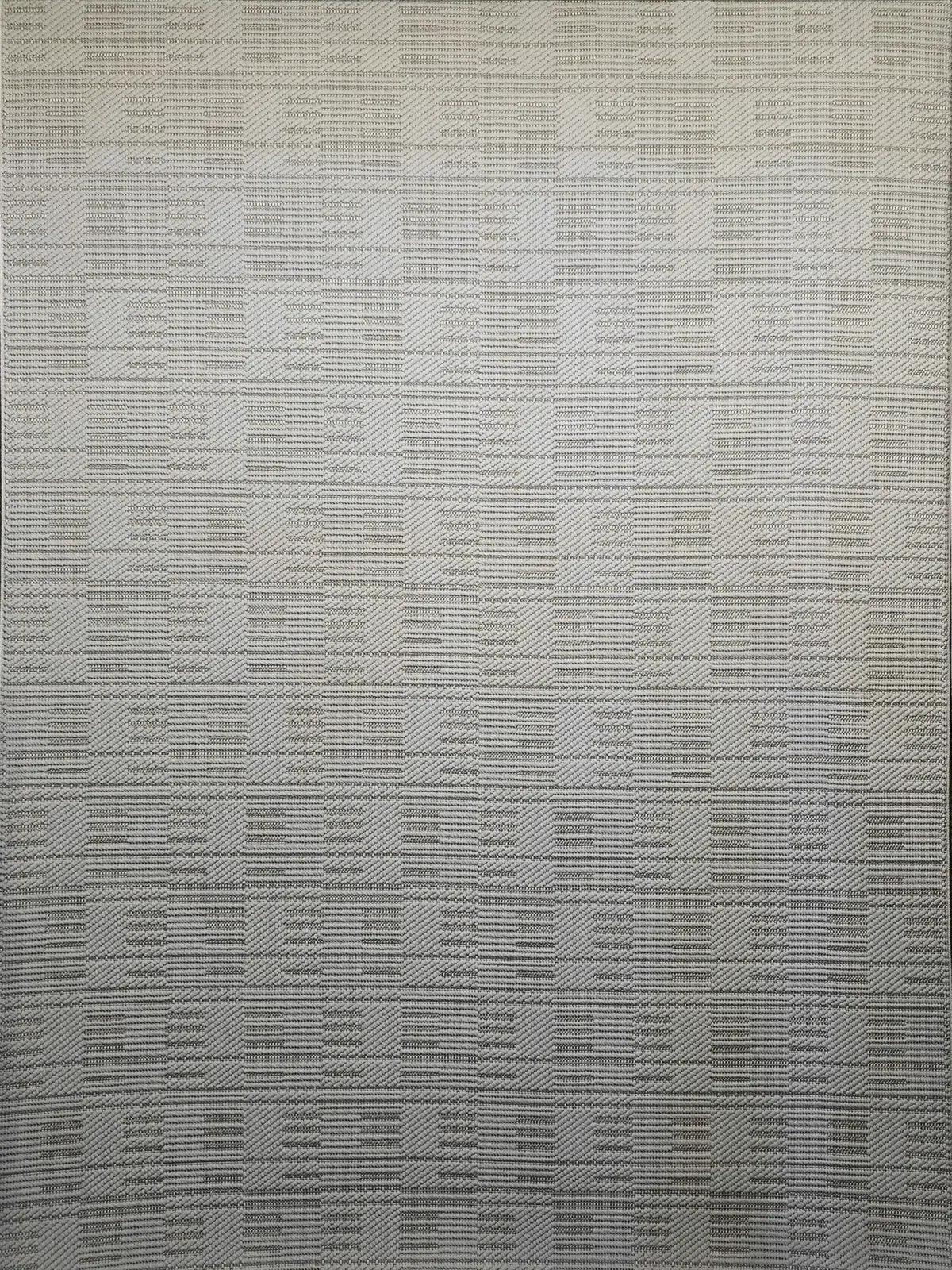 Top-down view of the Vortex rug with balanced square pattern layout