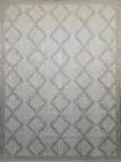 Flat image of the beige Nocturne rug with symmetrical diamond patterns
