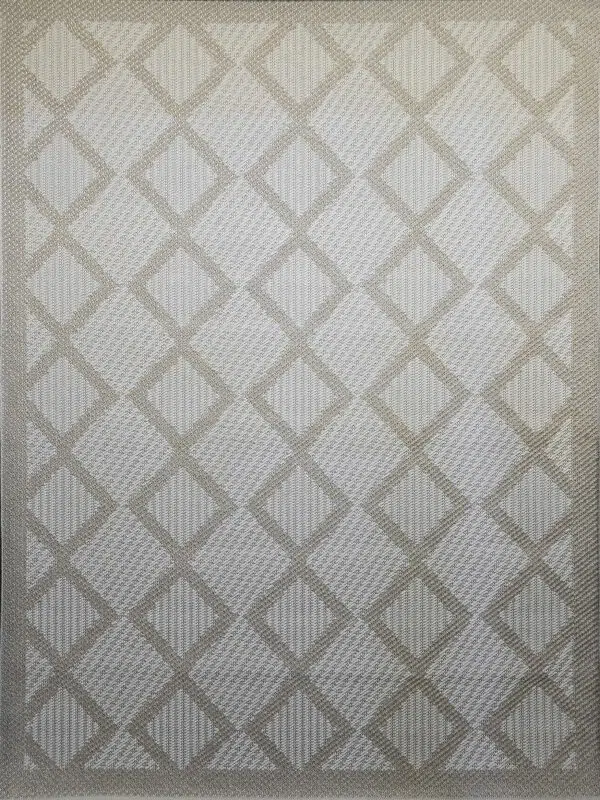 Flat image of the beige Nocturne rug with symmetrical diamond patterns
