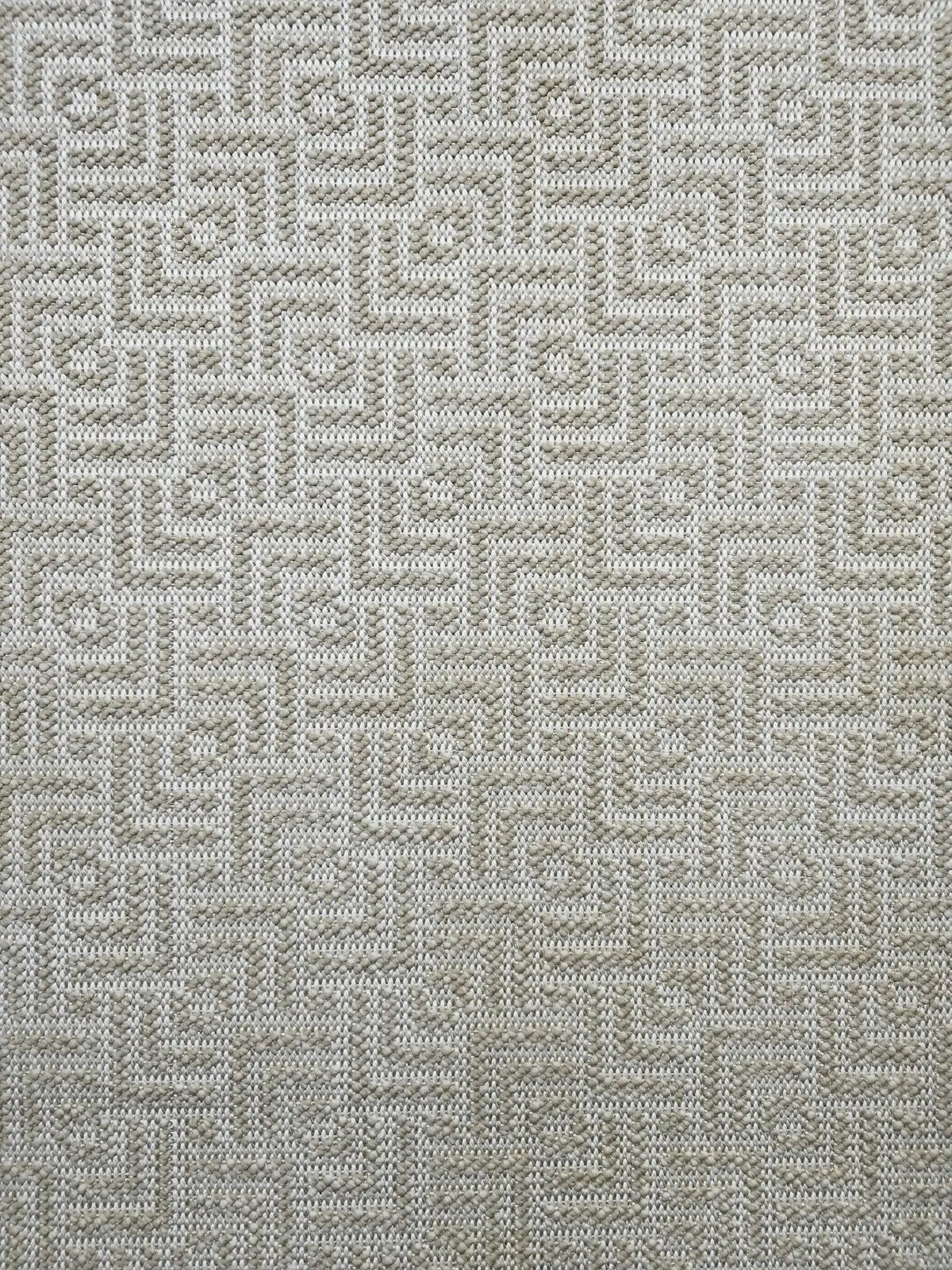 Close-up view of Oberon rug’s woven geometric texture