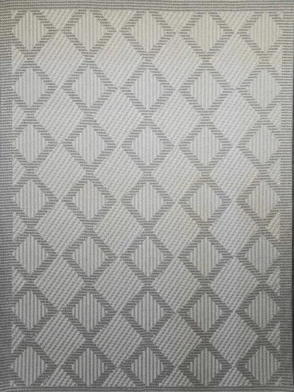 Complete flat layout of Zephyr rug with textured diamond grid design