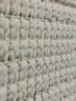 Side view close-up of the dense pile texture of Juno rug