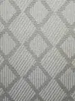 Zoomed-in image of Zephyr rug’s diamond pattern in neutral tones