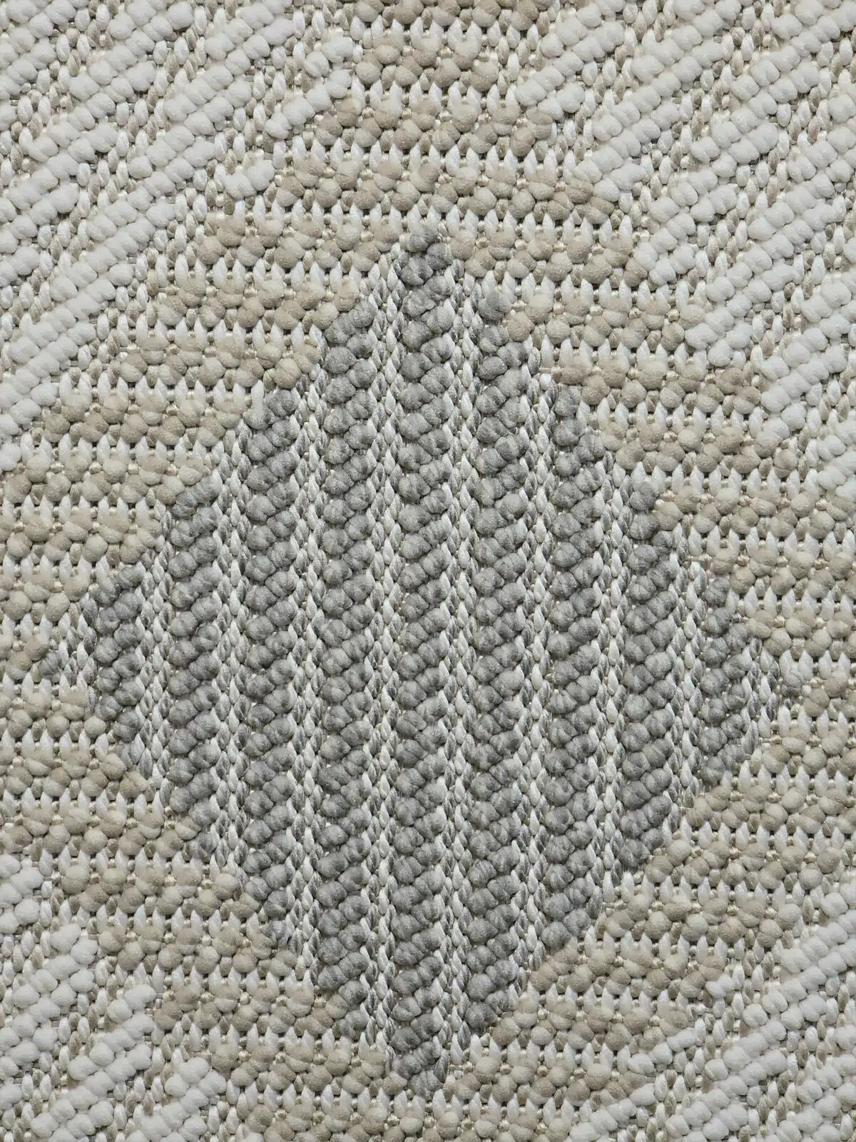Center detail of Crater rug showing woven pattern