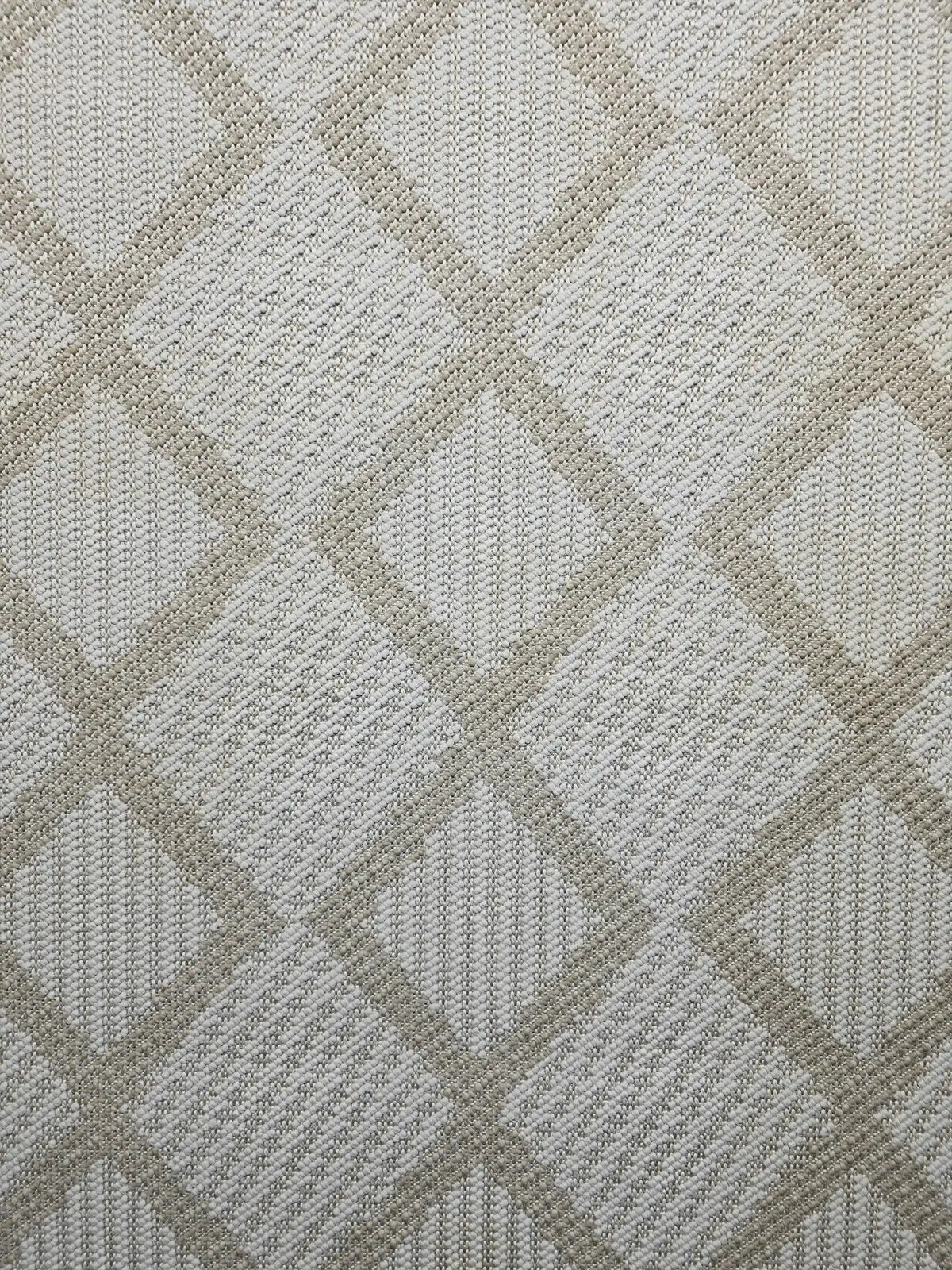 Mid-close texture view of the Nocturne diamond weave rug