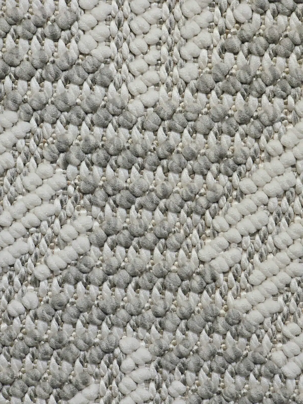 Detailed macro image of Zephyr rug yarn with plush and looped structure