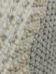 Side macro shot of Crater rug showing depth and softness