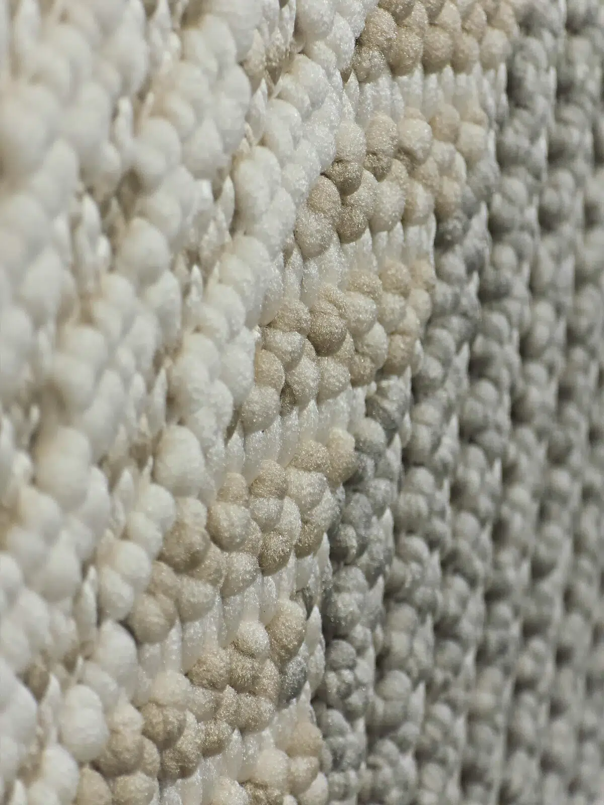Side macro shot of Crater rug showing depth and softness