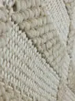 Side view showing the weave and structure of the Umbra rug.