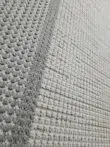 Angled shot of Juno carpet showing contrast between inner and outer border