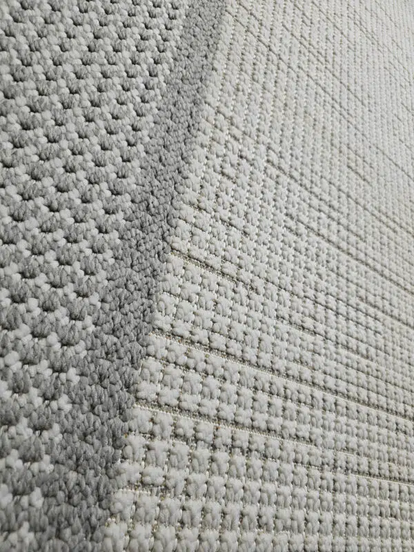 Angled shot of Juno carpet showing contrast between inner and outer border