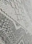 Angled close-up texture of Nebulon rug